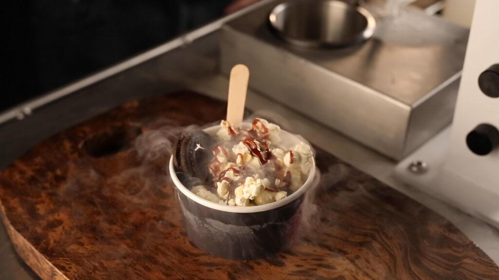Freshly churned liquid nitrogen ice cream bowl garnished with fresh berries