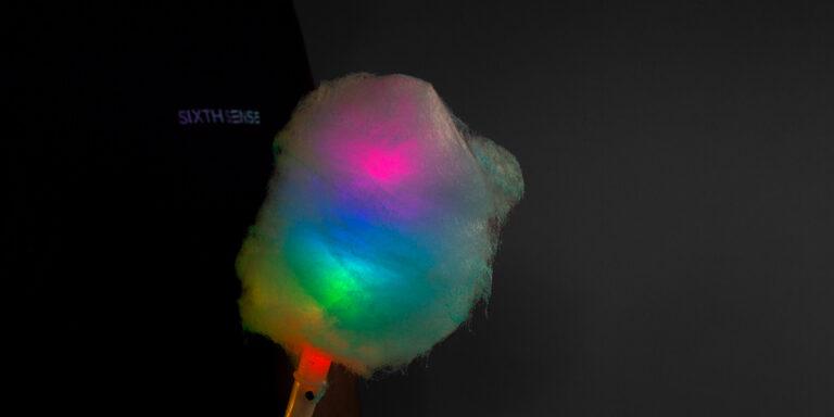 Neon candy floss hire with LED illuminated glow wands