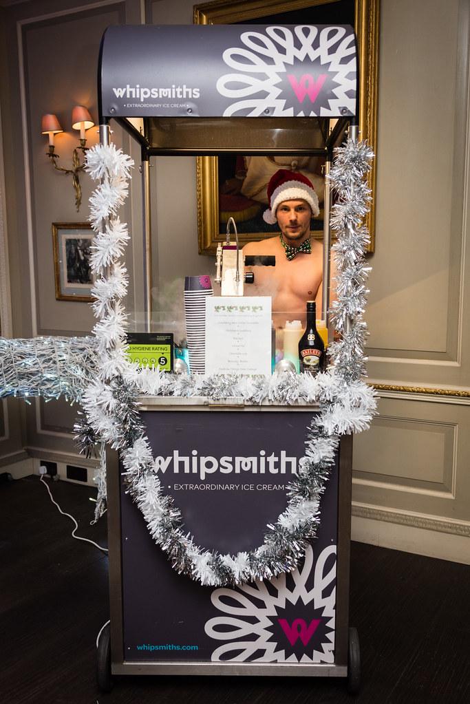 Festive Whipsmiths ice cream cart with Santa hat chef, Baileys Irish Cream and silver tinsel garland