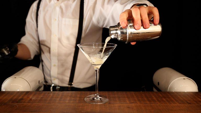 Flair Bartender Pouring Craft Cocktail From Shaker