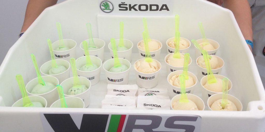 Close-up of branded Skoda vRS ice cream tubs and neon spoons ready for mobile crowd distribution