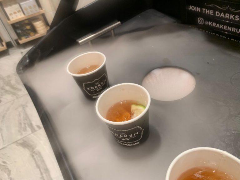 Kraken Rum branded tasting cups with lime garnish surrounded by billowing mist in The Misty Tray