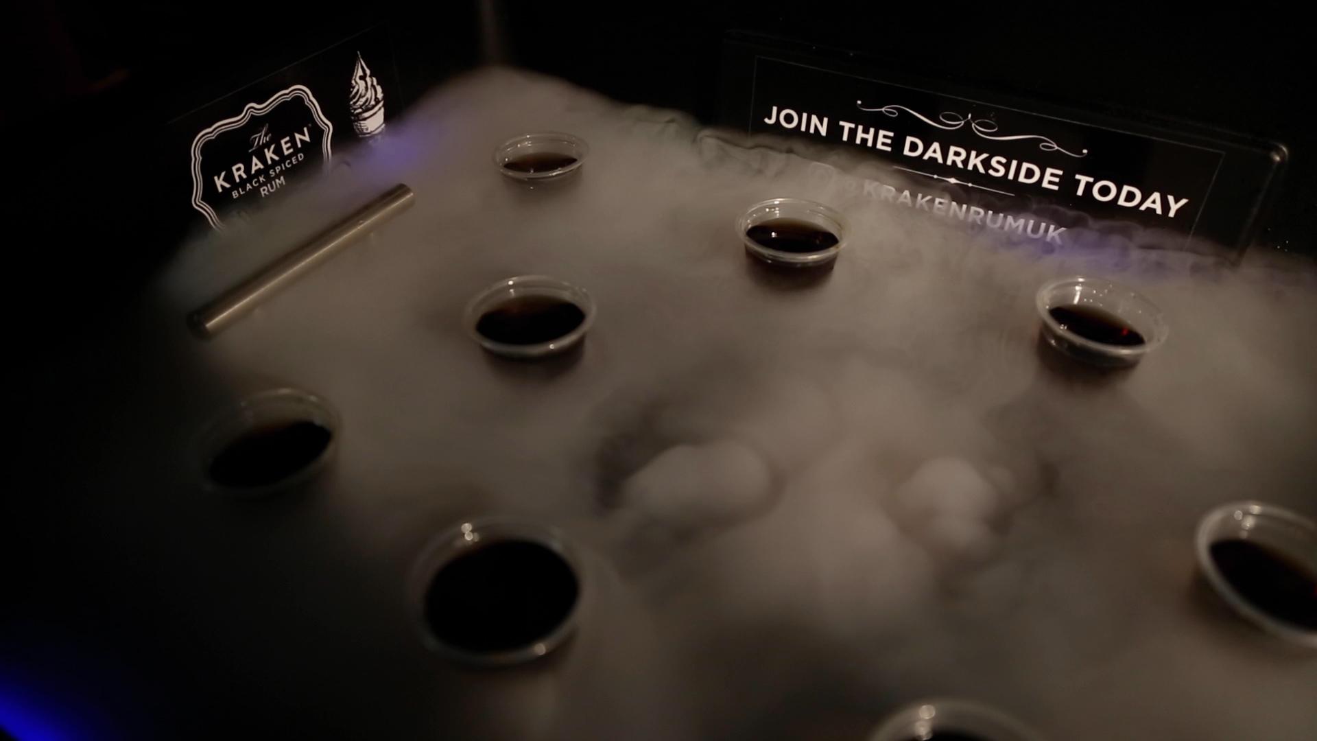 Theatrical smoking cocktail shots in The Misty Tray