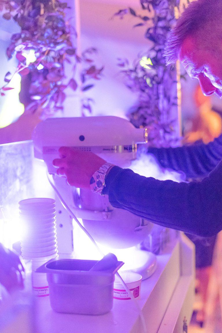 Chef serving wedding ice cream cart hire live theatre to guests
